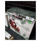 Fabric mache Victorian couple in carriage