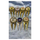 7 Collectable Metal Golf Tee Markers from Various