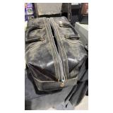 Vintage Black Doctor bag. It has electric cords Vintage Black Doctor bag. It has electric cords
