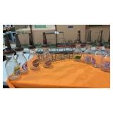 8 Glass Oil Bottles in Metal Carrier 8 Glass Oil Bottles in Metal Carrier
