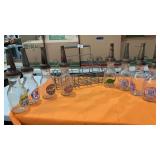 8 Glass Oil Bottles in Metal Carrier