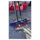 Three push brooms Three push brooms