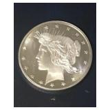 .999 1 OZ Silver Strike, Peace Face Motif