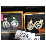 2 Sets of Mother of Pearl Hand Carved Screw Back