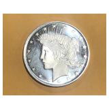 .999 1 oz Silver Strike,  PEACE HEAD MOTIF