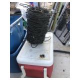 ice chest & roll or barbed wire