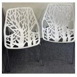 2 PASTIC CUT OUT CHAIRS