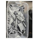 large tub of plastic trim pieces for metal awnings