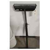 Adjustable roller stand