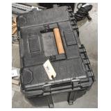 Rigid case full of miscellaneous parts