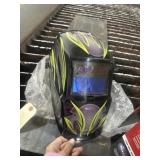 Auto darkening welding helmet