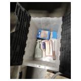 tub with miscellaneous tile tools and grout sealer