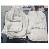 Stack of Bank Bags and Canvas Bags