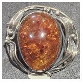 Amber and silver pin
