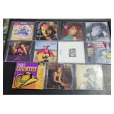 Assortment of country music CDs
