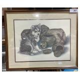 The framed artwork is a pencil signed print