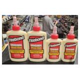 Four bottles of tape bond, wood glue