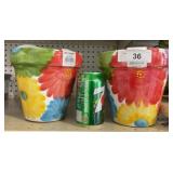 (2)  ceramic flowerpots  2x$