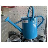 Blue watering can