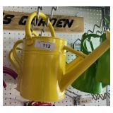 2 yellow watering cans