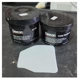 Devcon steel putty.  Resin and hardener
