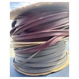 2 partial rolls of edging/piping burgundy and grey