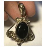 Sterling Pendant w/ Onyx Stone   8.1 grams tw