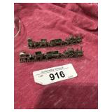 2 small pewter mini train sets