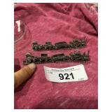 2 small pewter mini train sets