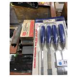 Package of Chisels and Sharpening Stones