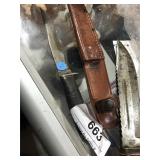 Vintage wooden knife in leather sheath