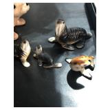 Ceramic miniature walruses, one seal