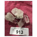 4 small quartz crystal points