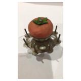 Vintage pin cushion in sport holder