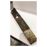 Cast-iron bear coat rack on wood