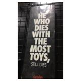 Framed Poster "He Who Dies with The Most Toys