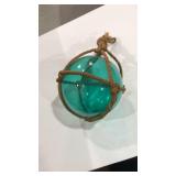 Vintage glass float with rope