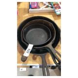 4 very size frying pans