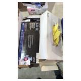 A partial box of small gloves, one box medium