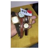 4 Watches - One Has Diamonds on Edge