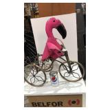 Metal Yard Art Item Display - Pink Flamingo Riding