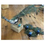 (B) Several Small Artificial Peacock with an Open