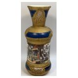 (D) Ornate Ceramic Vase Featuring A Bucolic