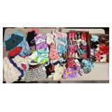 Red Storage Tote with Several Assorted Doll