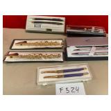 N - LOT OF PEN SETS & BRACELET BUDDIES (F524)