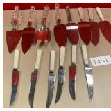 11 - STAINLESS KNIVES & CAKE SERVERS (F131)