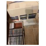 O - SOFTWARE DISCS IN RACK, CASSETTES (A94)