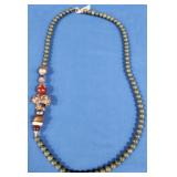 341 - BEADED NECKLACE W/ CARVED STONE FEATURE (C43