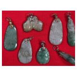 11 - LOT OF 7 POLISHED STONE PENDANTS (A56)