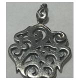 A LARGE STERLING SILVER PENDANT 18.80GRS